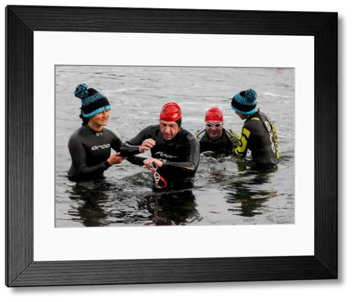 Framed Print : A swimmer finishing the first leg of the 2014 Celtman Triathlon