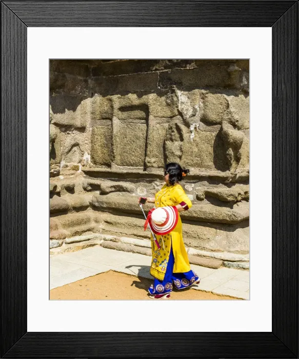 Framed Print : A visitor walking beside Shore Temple at Mamallapuram in Tamil Nadu, India
