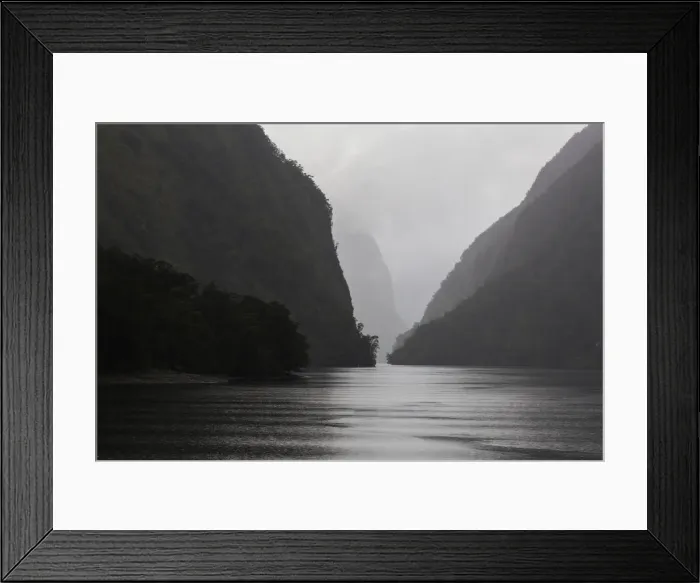 Framed Print : Dark clouds and misty weather in Doubtful Sound, Southland in New Zealand Framed Print : Dark clouds and misty weather in Doubtful Sound, Southland in New Zealand