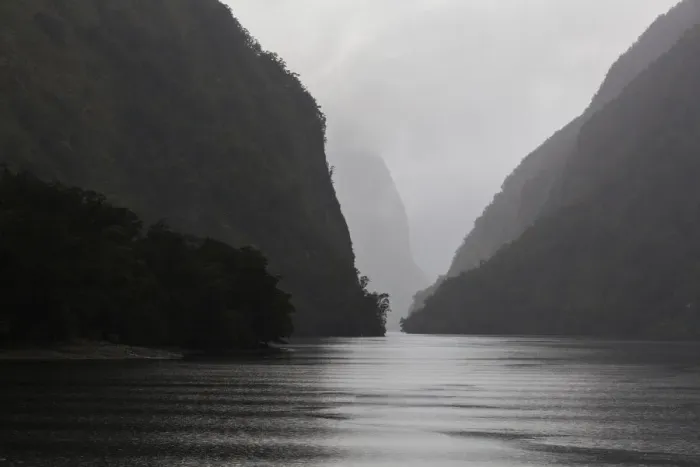 Framed Print : Dark clouds and misty weather in Doubtful Sound, Southland in New Zealand Framed Print : Dark clouds and misty weather in Doubtful Sound, Southland in New Zealand