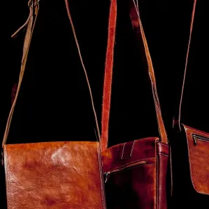 Selling handbags in Santa Pola, Spain