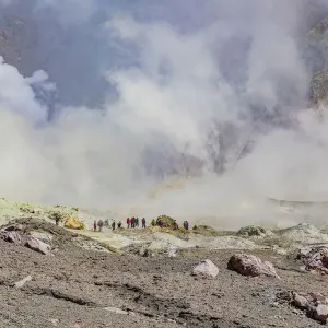 Tourists at the volcanic White Island in Bay of Plenty, New Zealand