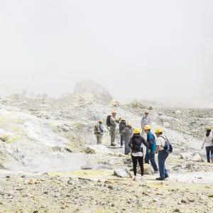 Tourists at the volcanic White Island in Bay of Plenty, New Zealand