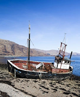 Mountains Prints: A beached boat at Ardgour, Scotland