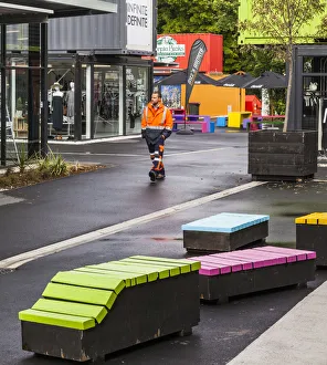 : A building worker walking past temporary buildings which were erected after the 2011 earthquake in Christchurch