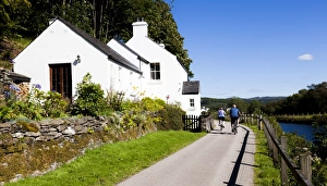 Cyclists beside the Crinan Canal, Scotland
