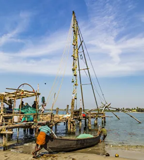 India Prints: A fishing boat and the Chinese fishing nets at Fort Kochi in Kerala, India