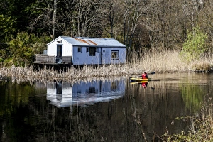A kayaker on the Crinan Canal, Argyll & Bute, Scotland