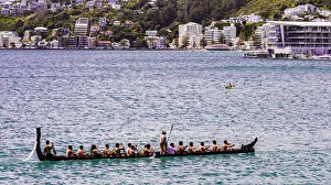 : A Maori canoe in the harbour at Wellington, New Zealand