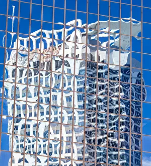 New Zealand Prints: Reflections in the windows of an office block in Auckland, New Zealand