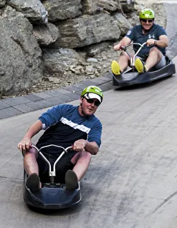 : Two riders on the luge at Queenstown in Otago, New Zealand
