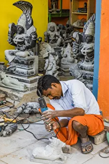 India Prints: A stone carver at Mamallapuram in Tamil Nadu, India