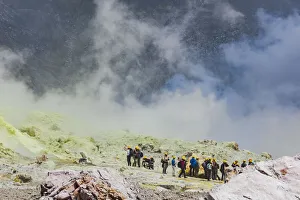 : Tourists at the volcanic White Island in Bay of Plenty, New Zealand