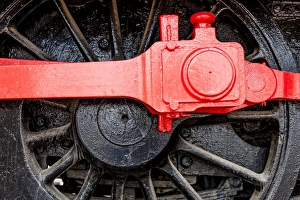 Black Prints: A wheel of a railway locomotive in Aguilas, Spain